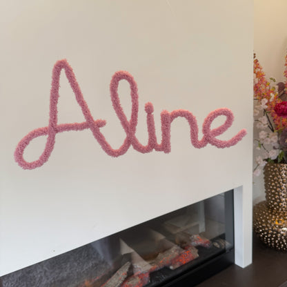 Roze teddynaam kinderkamer